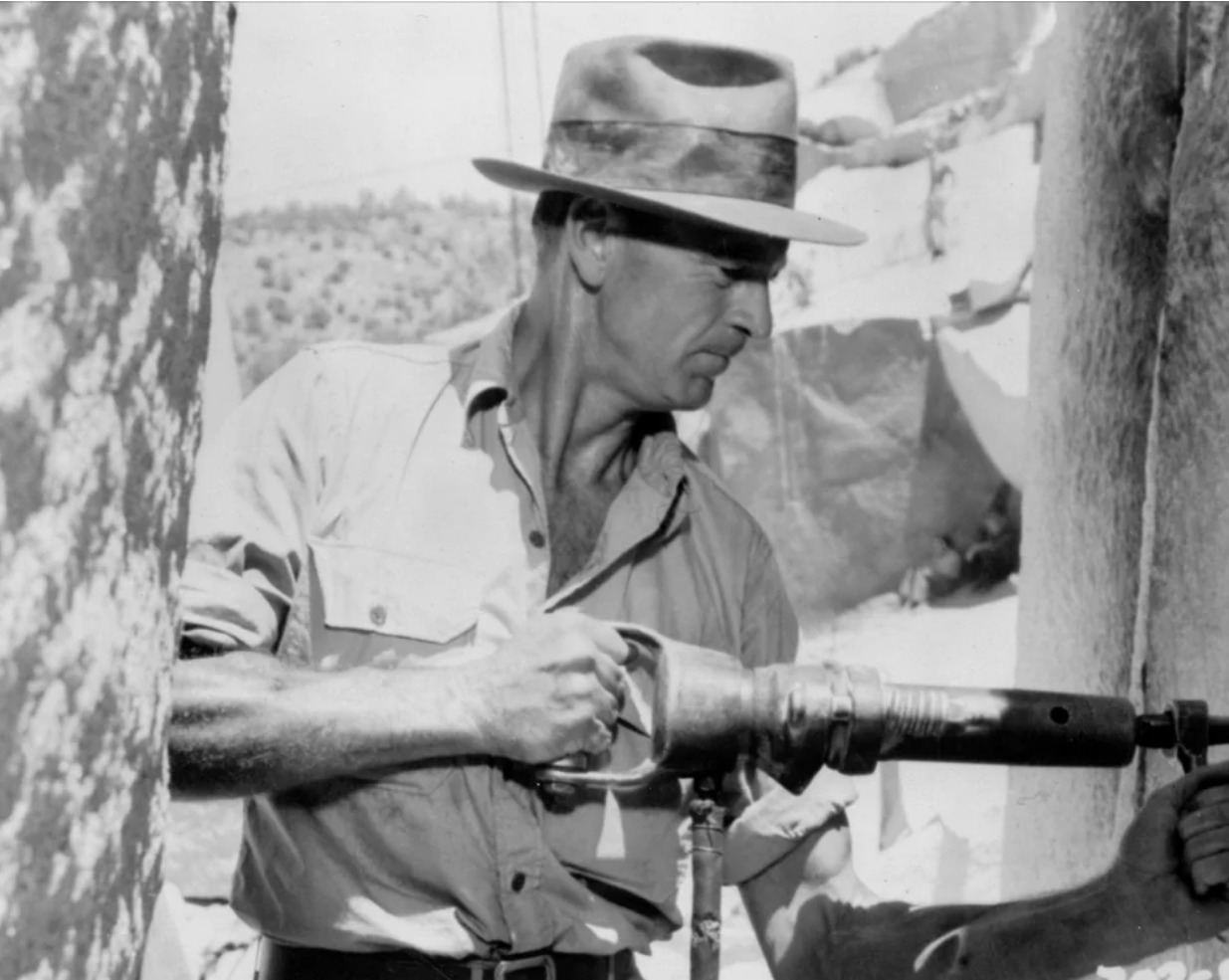 Gary Cooper as Howard Roark operating a jackhammer in the granite quarry, The Fountainhead (1949)